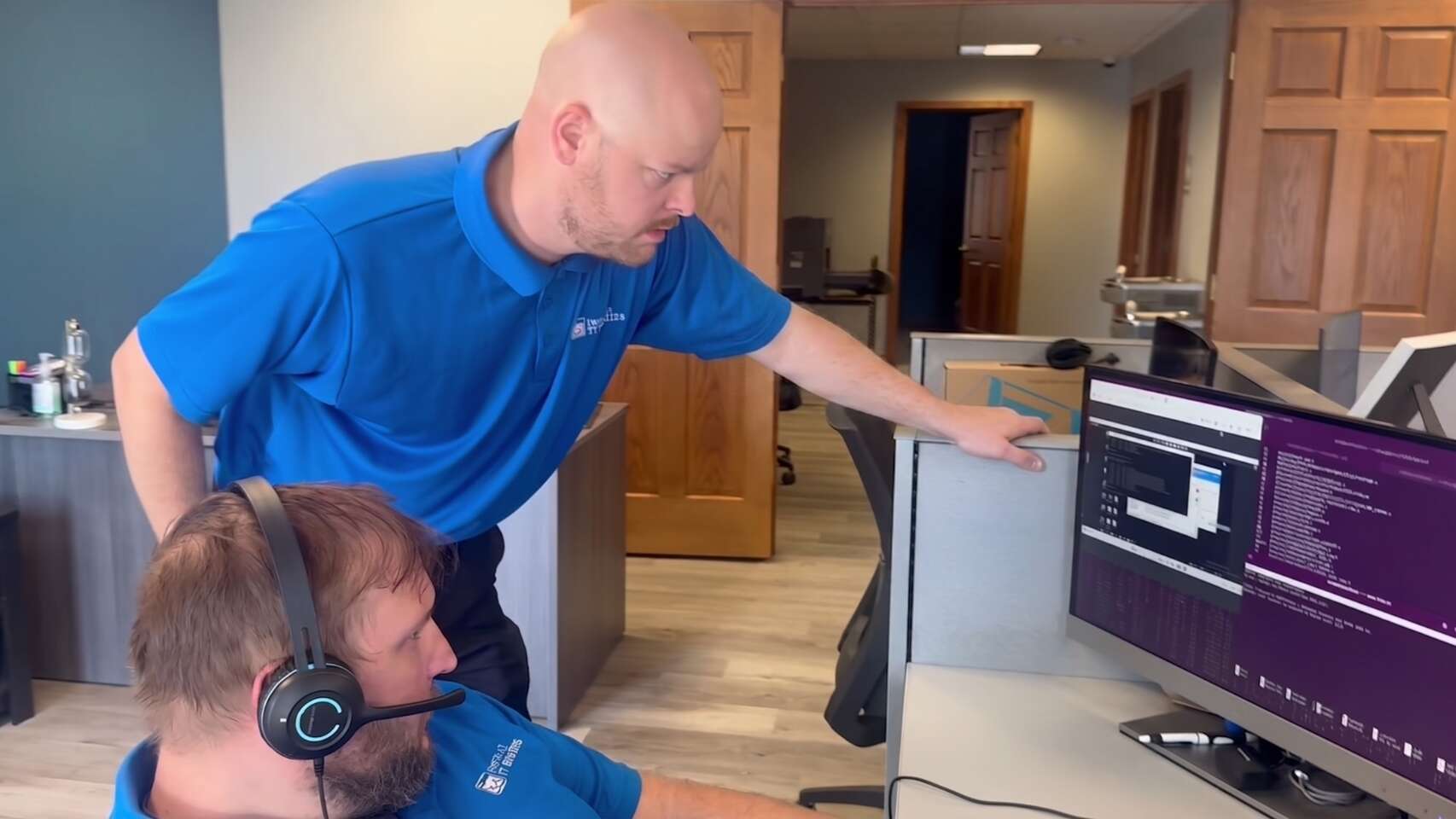 Buffalo IT Services technicians troubleshooting a dental office phone and network issue